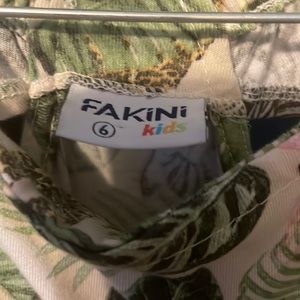 Size 6 girls summer dress has cheetah lions